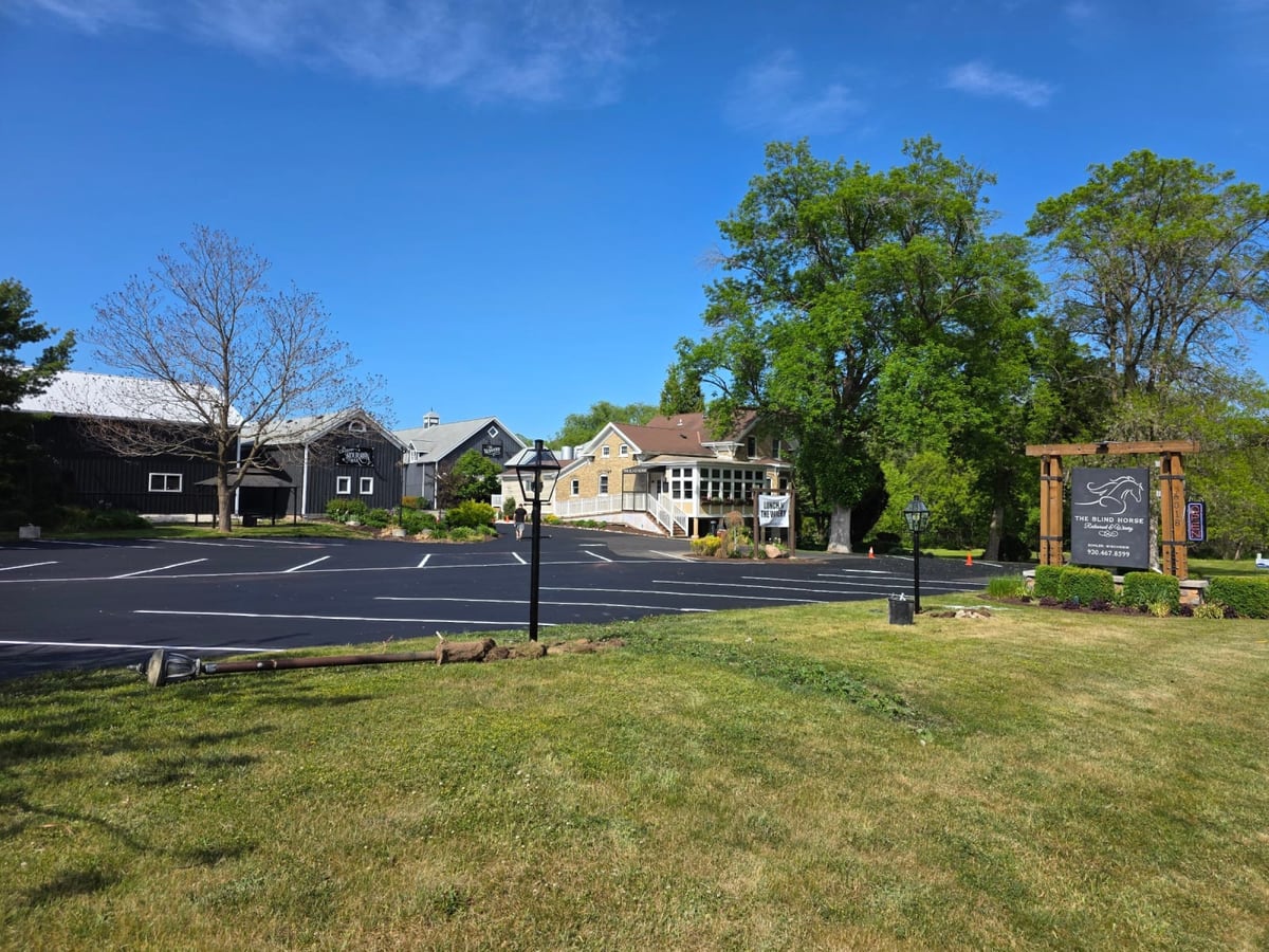 a senior-living community with a freshly striped and sealed parking area by Draki Enterprises in Wisconsin